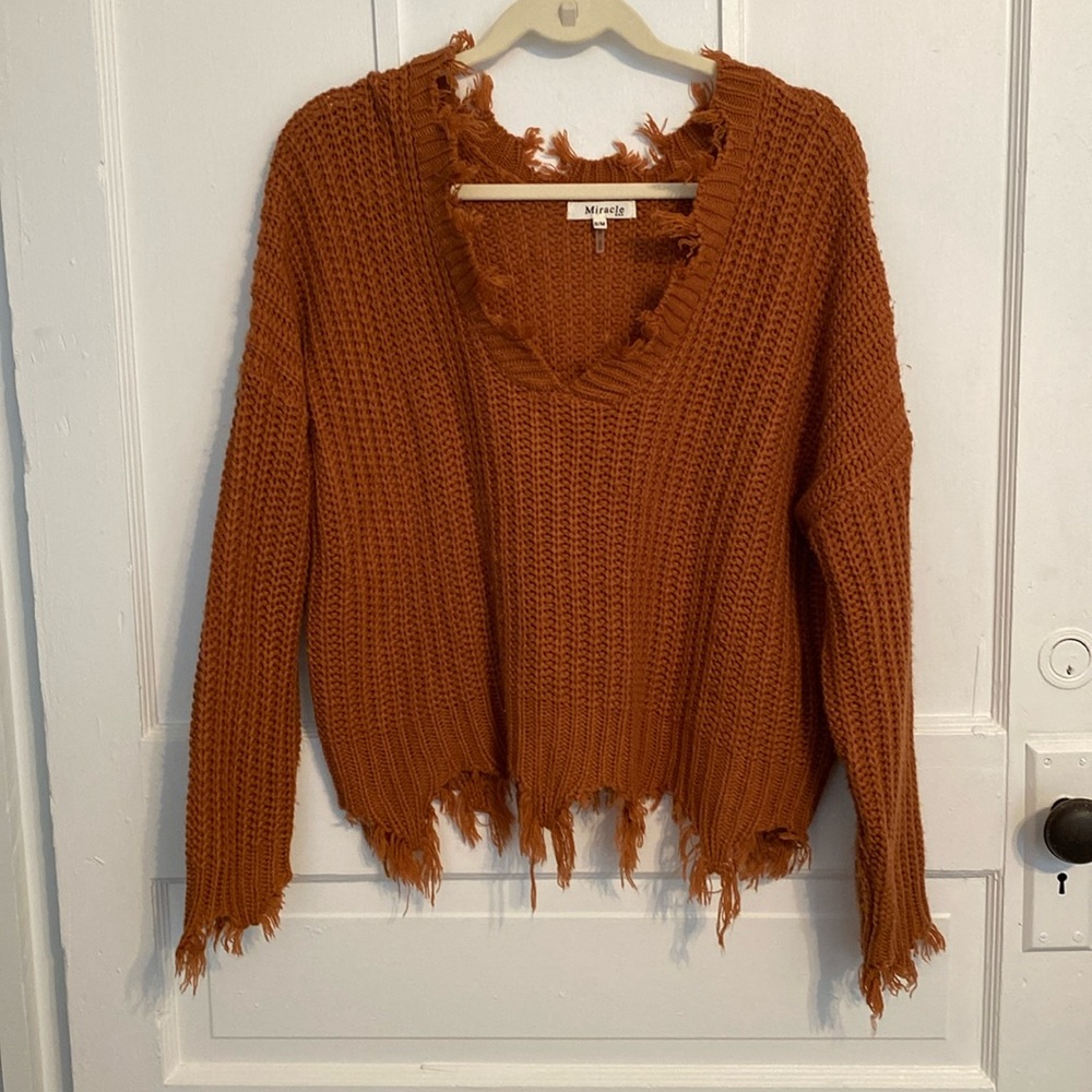 Miracle burnt orange frayed hem sweater